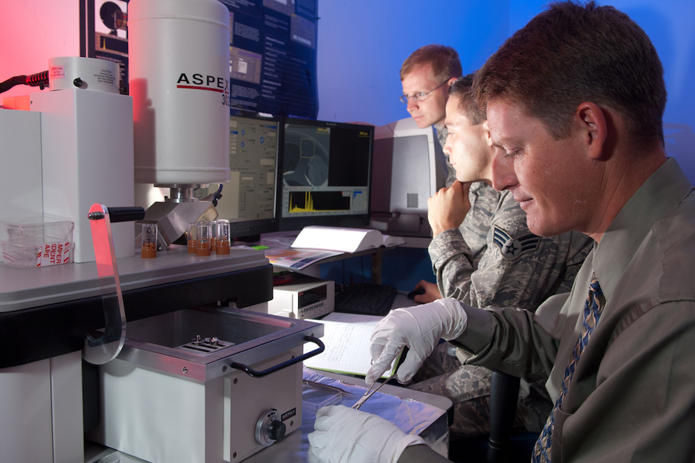 Airman working with civilians