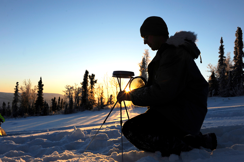 Technician gathering data in the Arctic